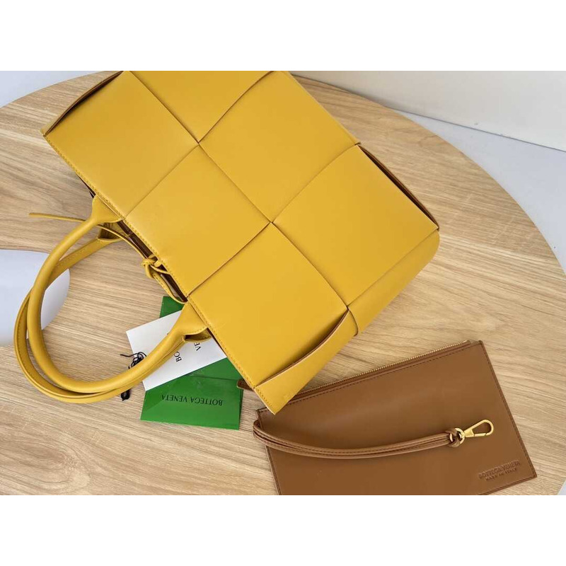 Bo*te*ga ve*ne*ta arco lambskin leather tote bag yellow