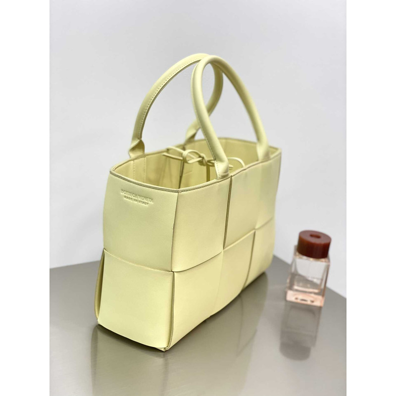 Bo*te*ga ve*ne*ta arco lambskin leather tote bag light yellow