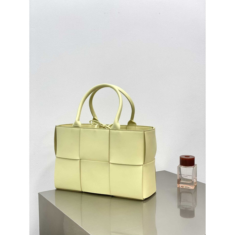 Bo*te*ga ve*ne*ta arco lambskin leather tote bag light yellow