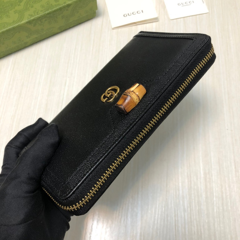 G*u*i  diana continental zip around leather wallet black