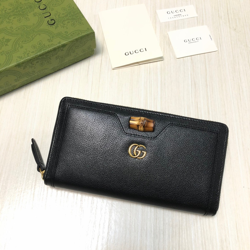 G*u*i  diana continental zip around leather wallet black