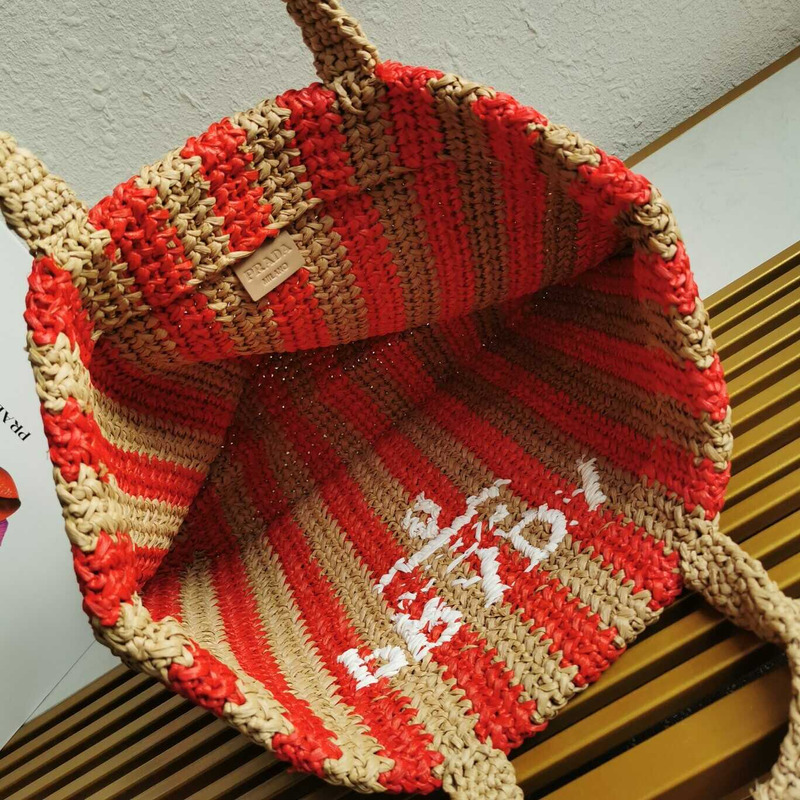 Pra*a large raffia tote bag tan/red