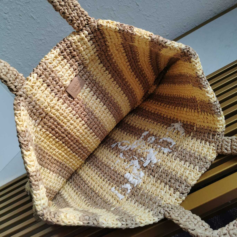 Pra*a large raffia tote bag tan/coffee