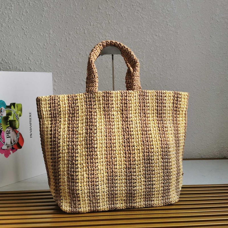 Pra*a large raffia tote bag tan/coffee