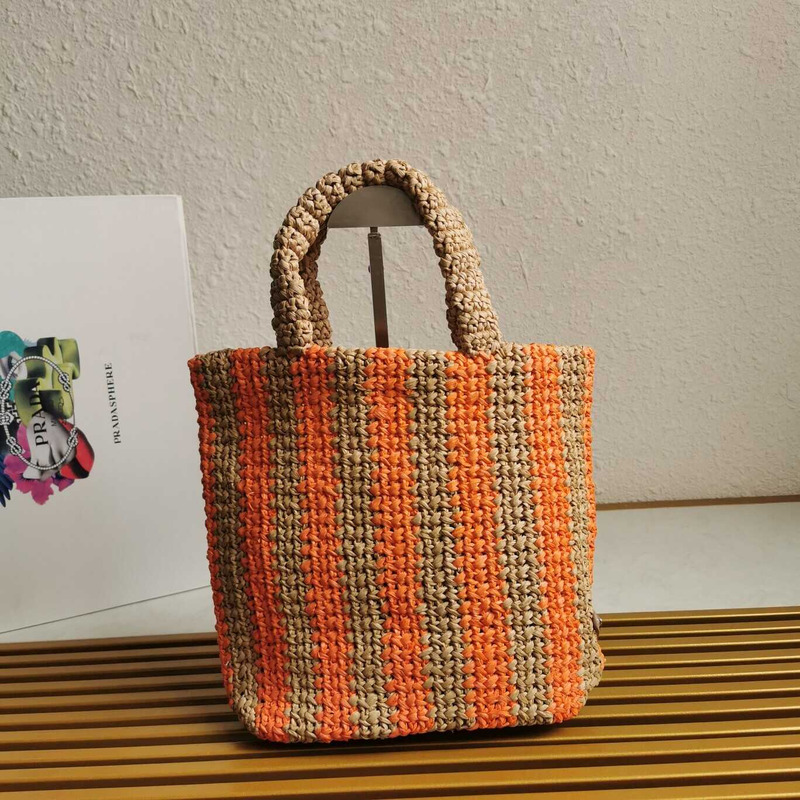 Pra*a large raffia tote bag tan/orange