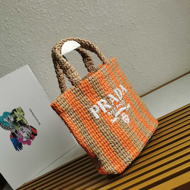 Pra*a large raffia tote bag tan/orange