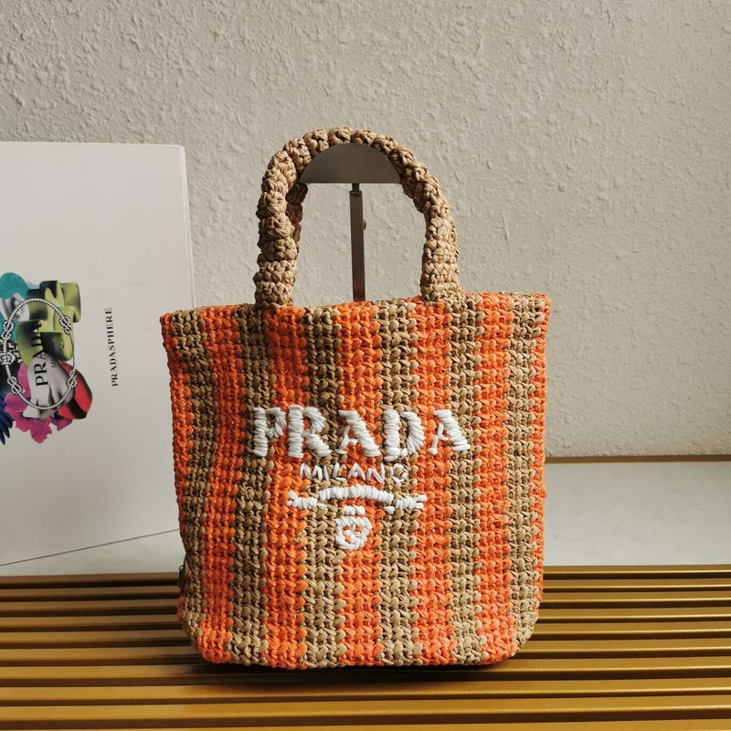 Pra*a large raffia tote bag tan/orange