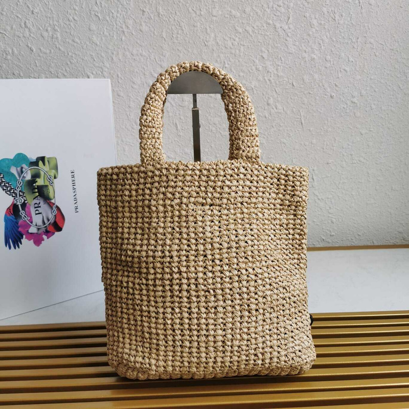 Pra*a large raffia tote bag tan