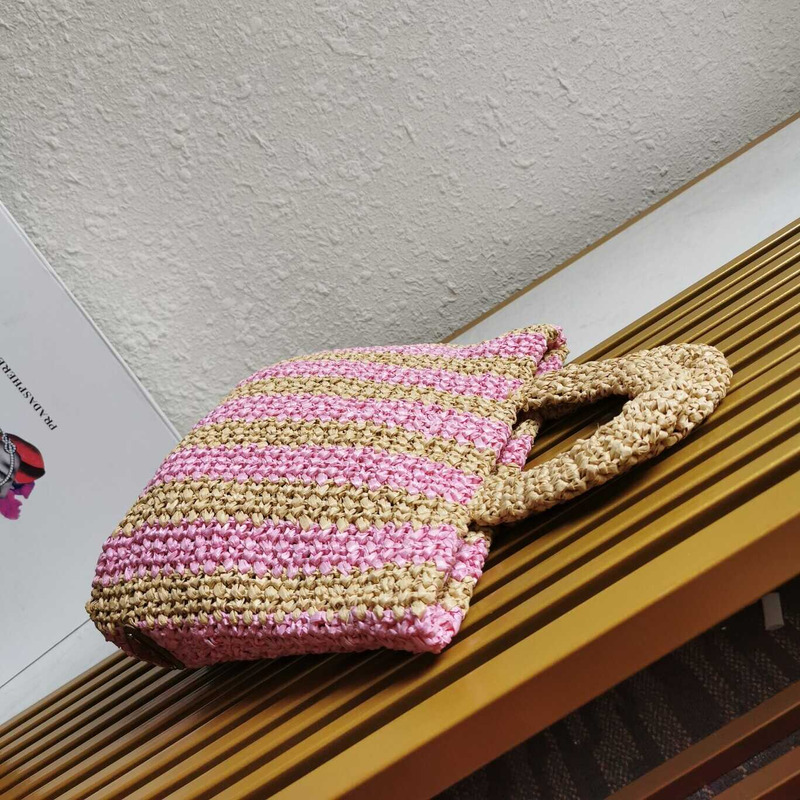 Pra*a Pra*a large raffia tote bag tan/pink