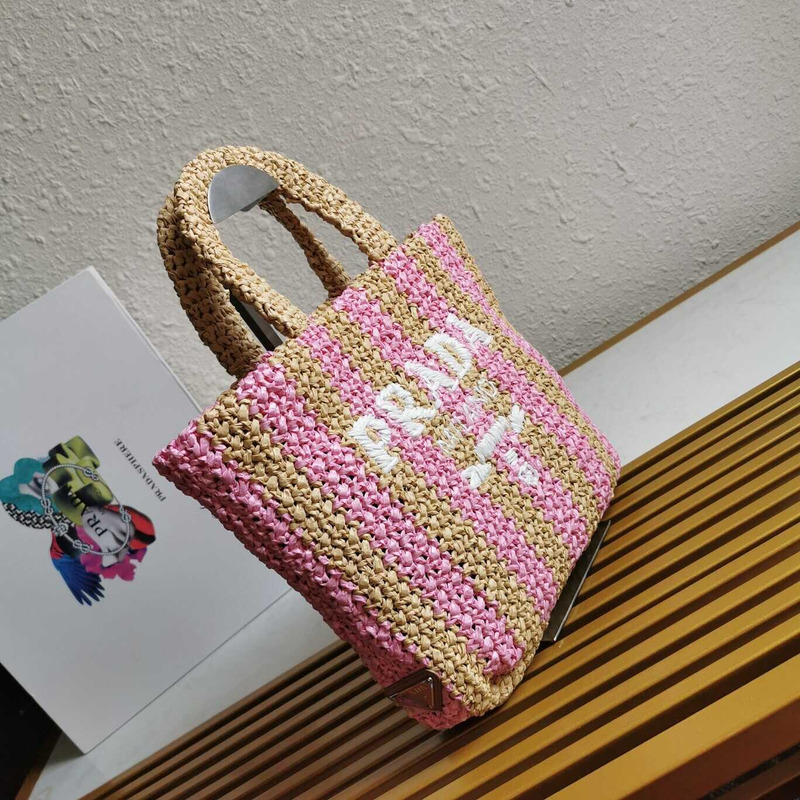 Pra*a Pra*a large raffia tote bag tan/pink