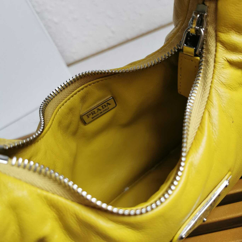 Pra*a soft padded nappa-leather mini bag yellow