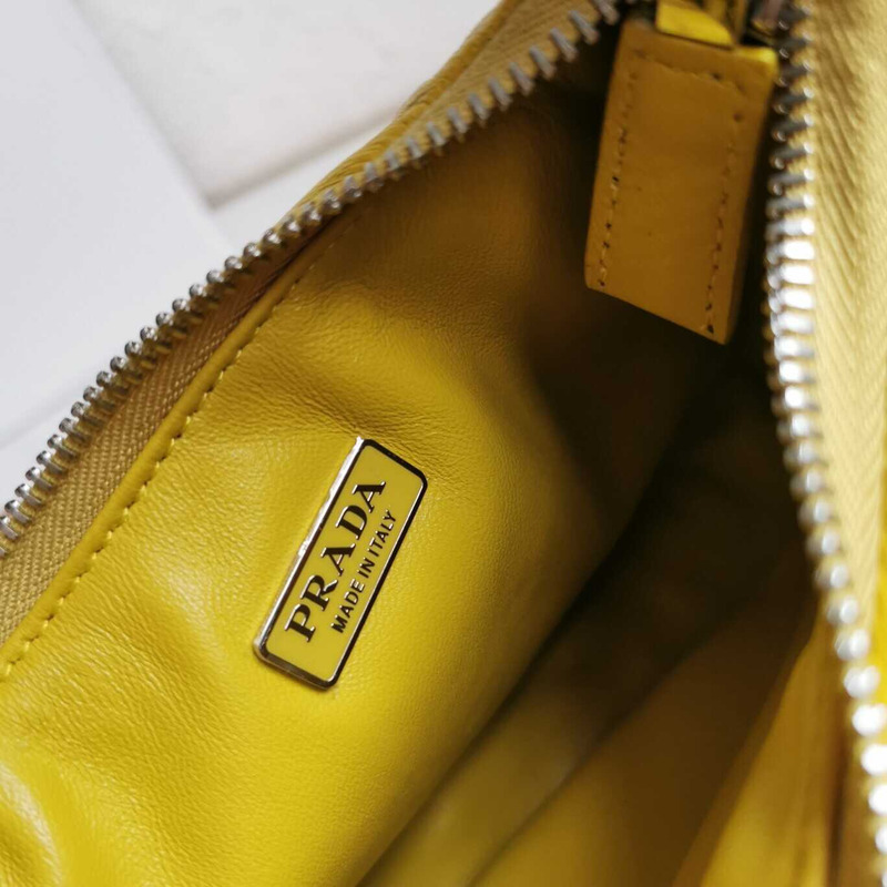 Pra*a soft padded nappa-leather mini bag yellow