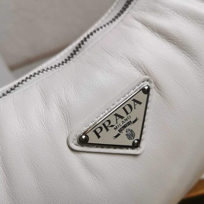 Pra*a soft padded nappa-leather mini bag white