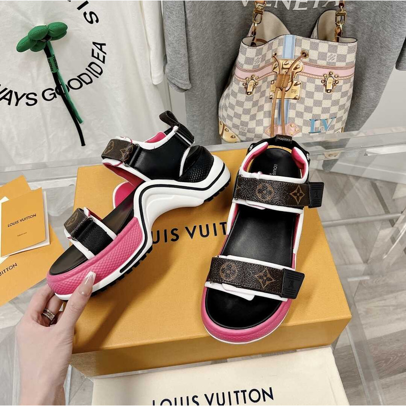 l**is V*t*n archlight sandal black and pink