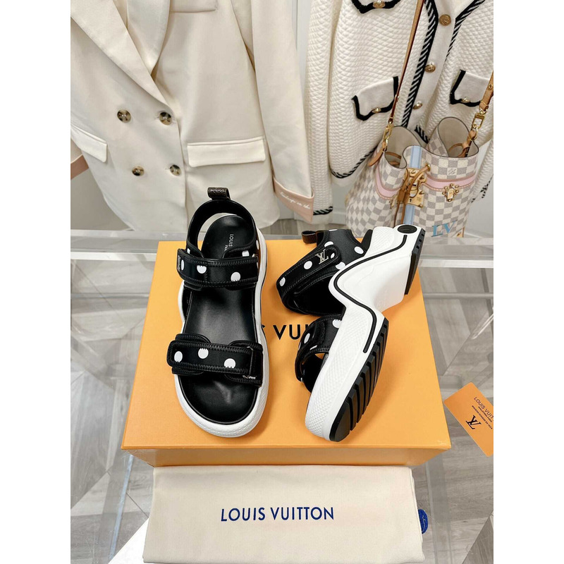 l**is V*t*n archlight sandal black and white