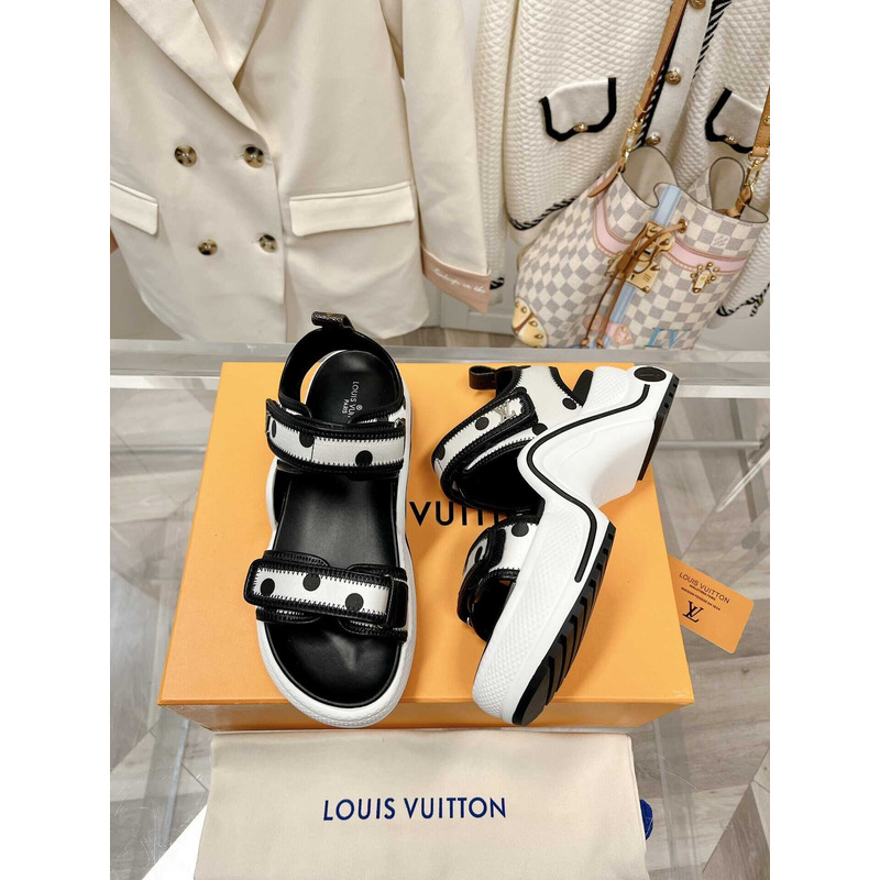 l**is V*t*n archlight sandal black and white