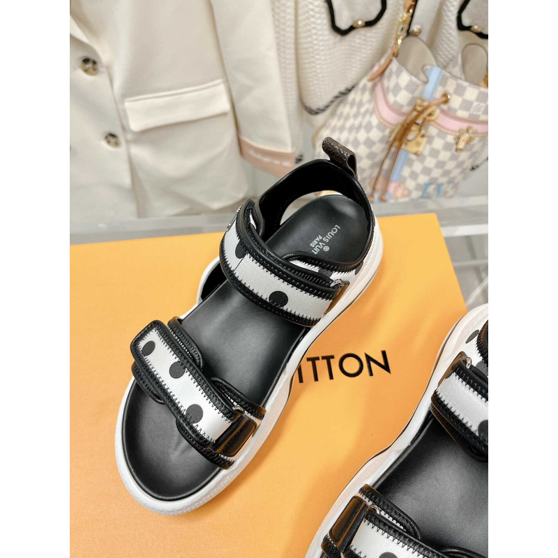 l**is V*t*n archlight sandal black and white