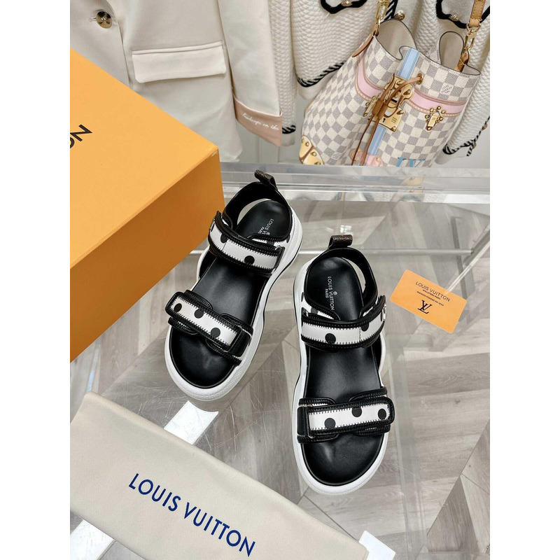 l**is V*t*n archlight sandal black and white