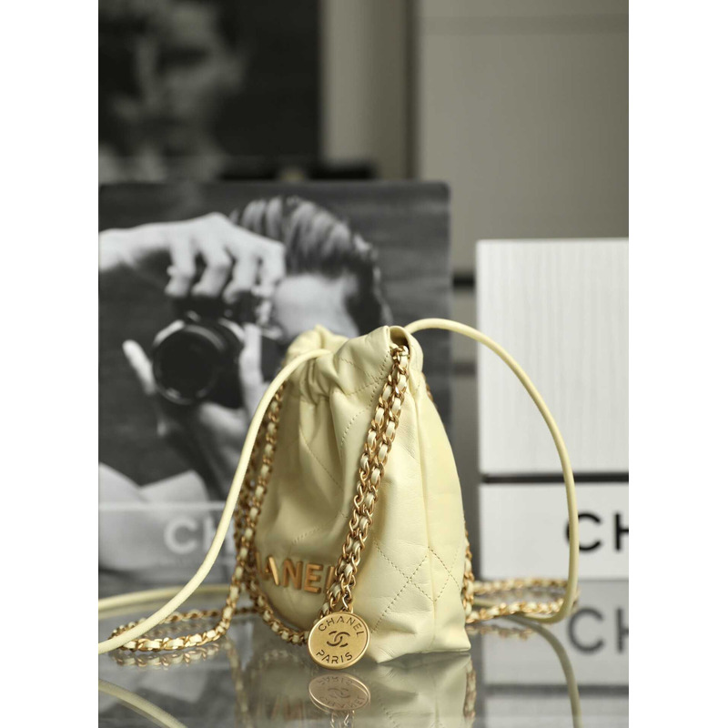 Ch*el 22 mini handbag shiny calfskin & gold-tone metal light yellow