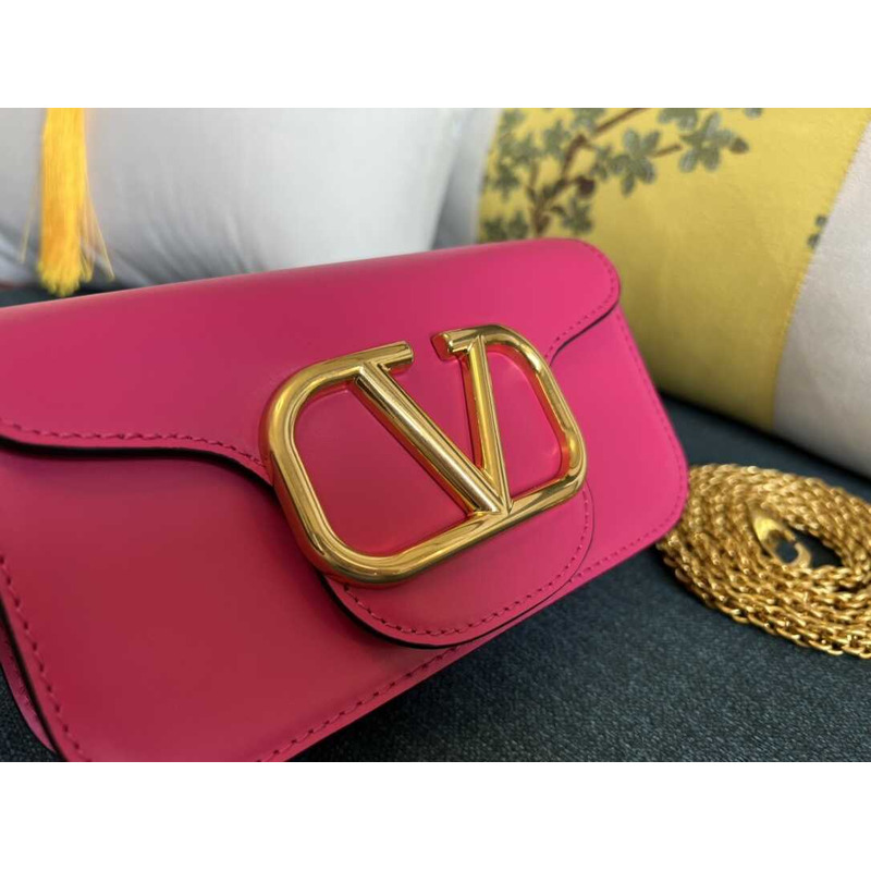 Valentino Garavani V Logo Leather Baguette Bag Pink