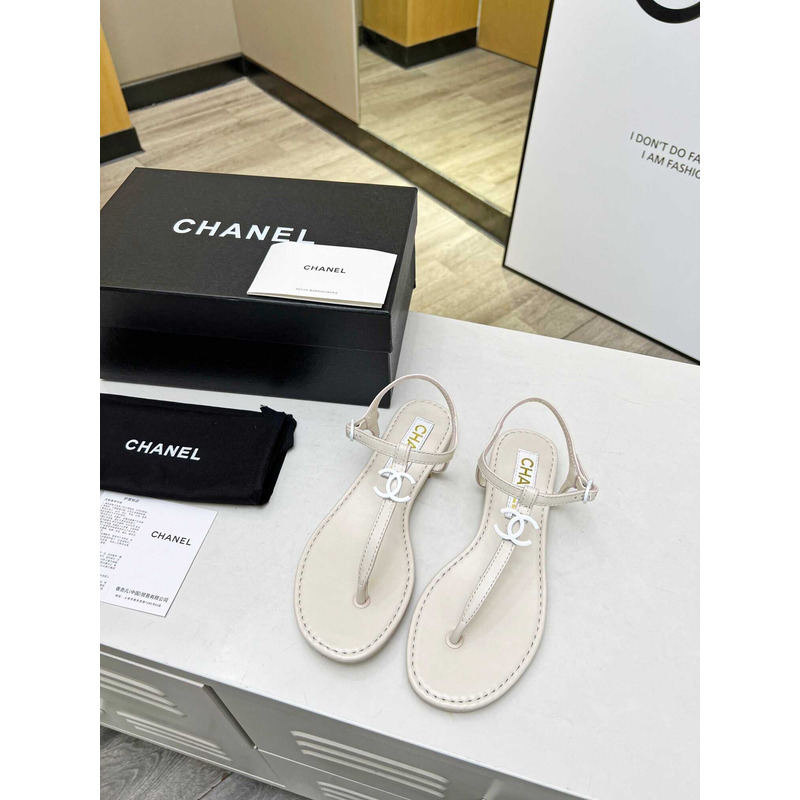 Ch*el lambskin & strass sandal white