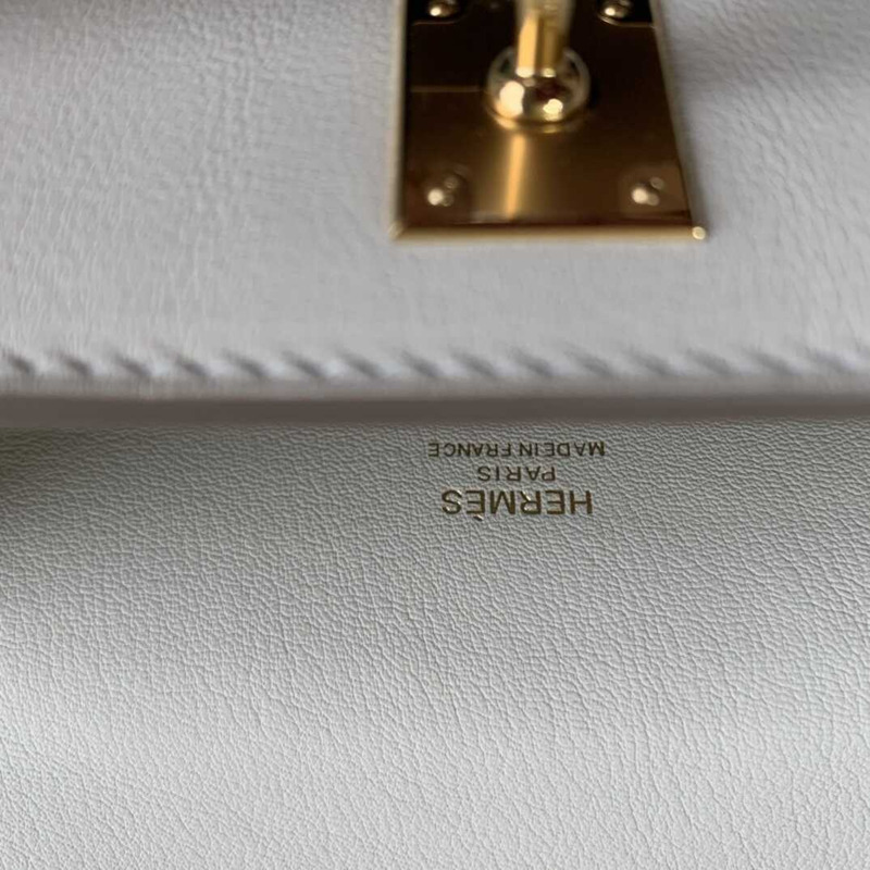 H**mes gold kelly pochette in white leather with gold hardware mini