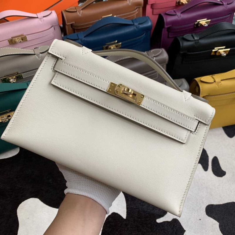 H**mes gold kelly pochette in white leather with gold hardware mini