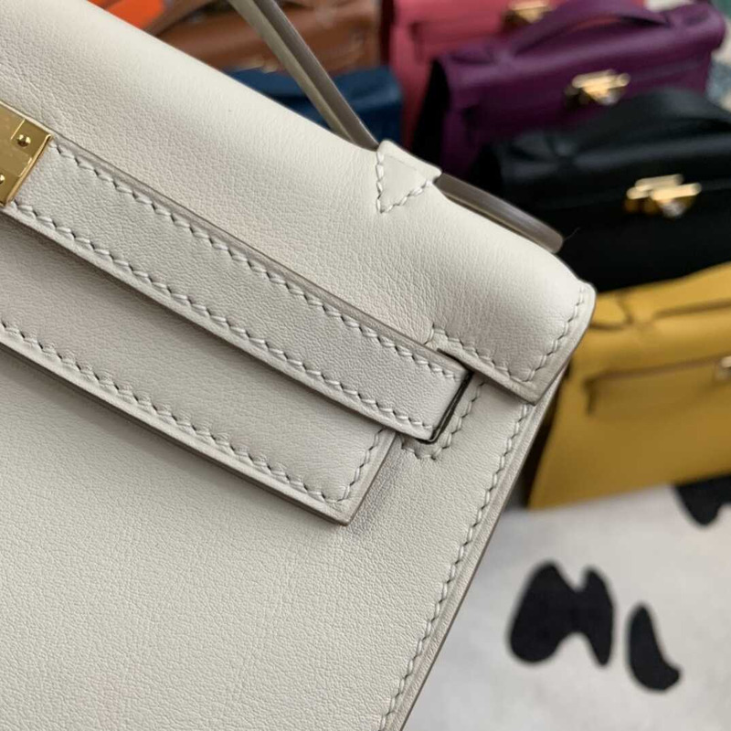 H**mes gold kelly pochette in white leather with gold hardware mini