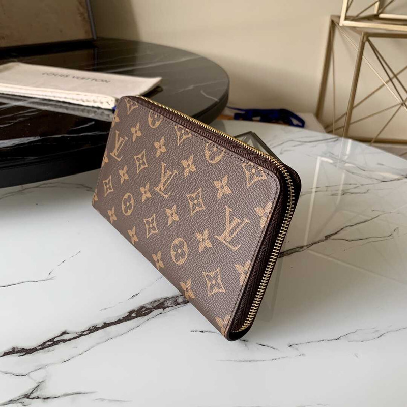 l**is V*t*n zipper wallet brown