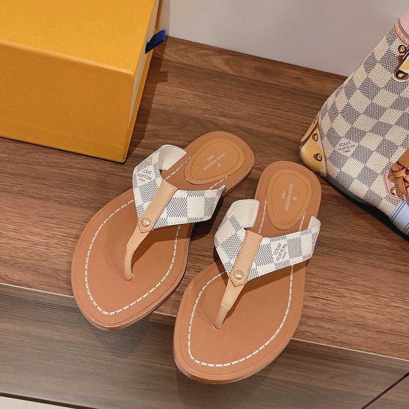 l**is V*t*n sunny flat thong slides