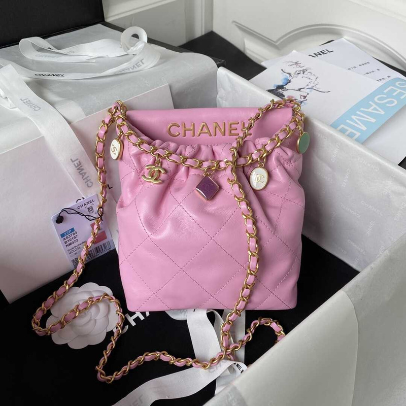 Ch*el small bucket bag lambskin resin & gold-tone metal pink