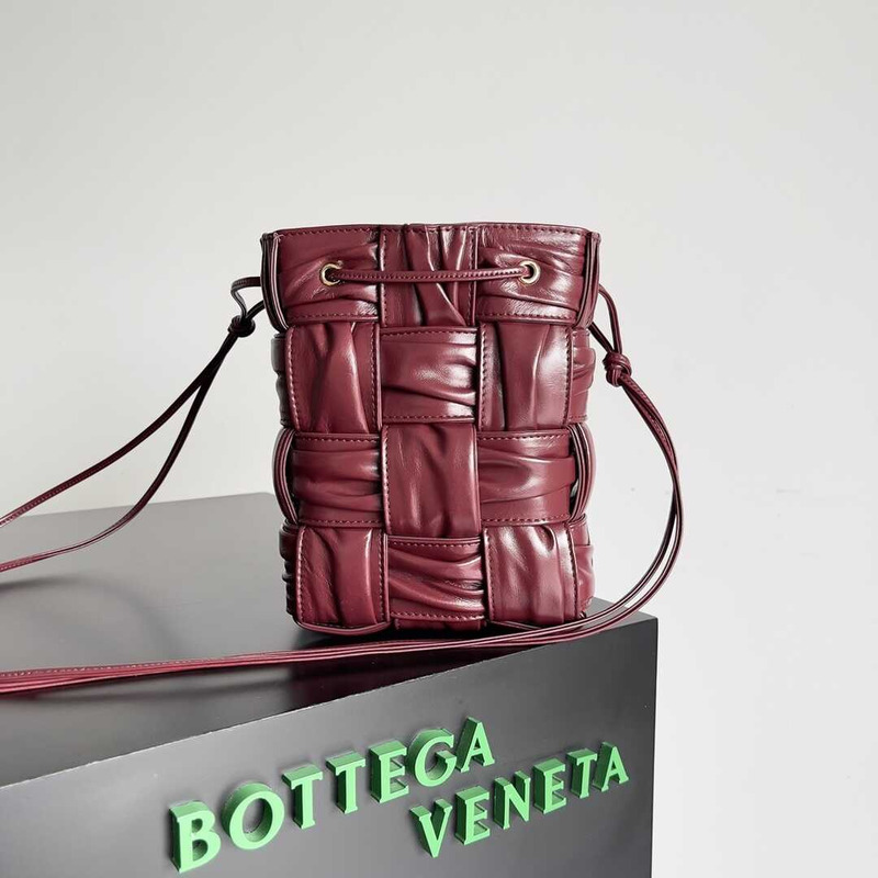 Bo*te*ga ve*ne*ta small sheepskin cassette bucket bag burgundy