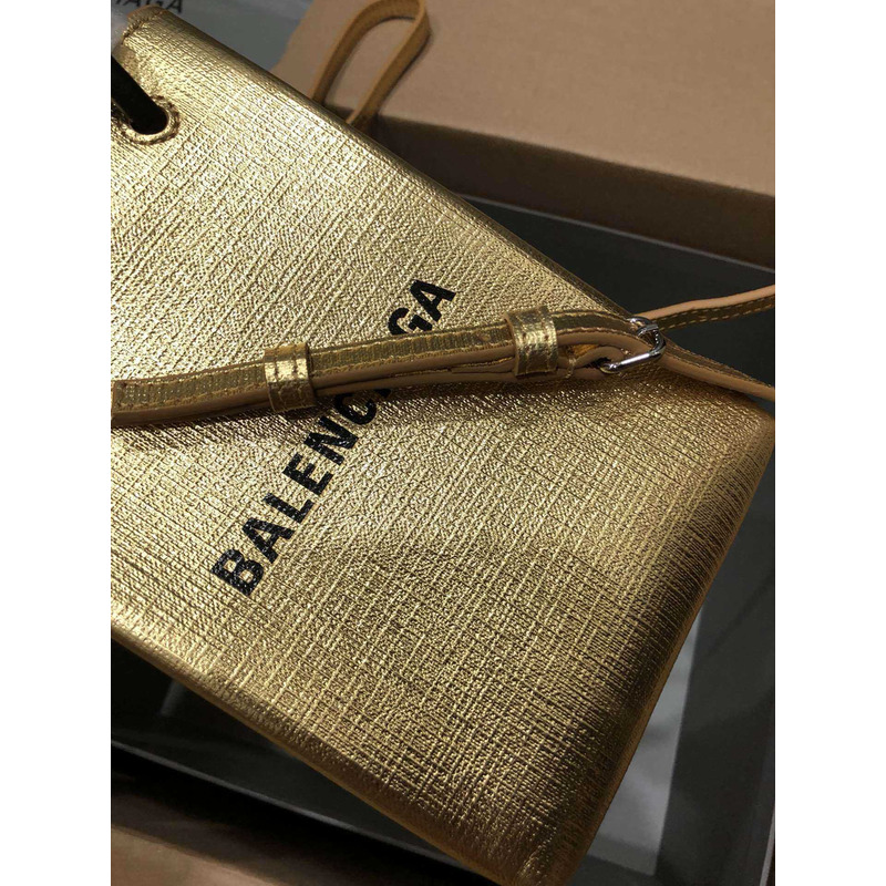 Ba*len*cia*ga textured calfskin logo shopping phone holder bag gold