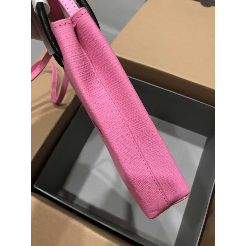 Ba*len*cia*ga textured calfskin logo shopping phone holder bag pink