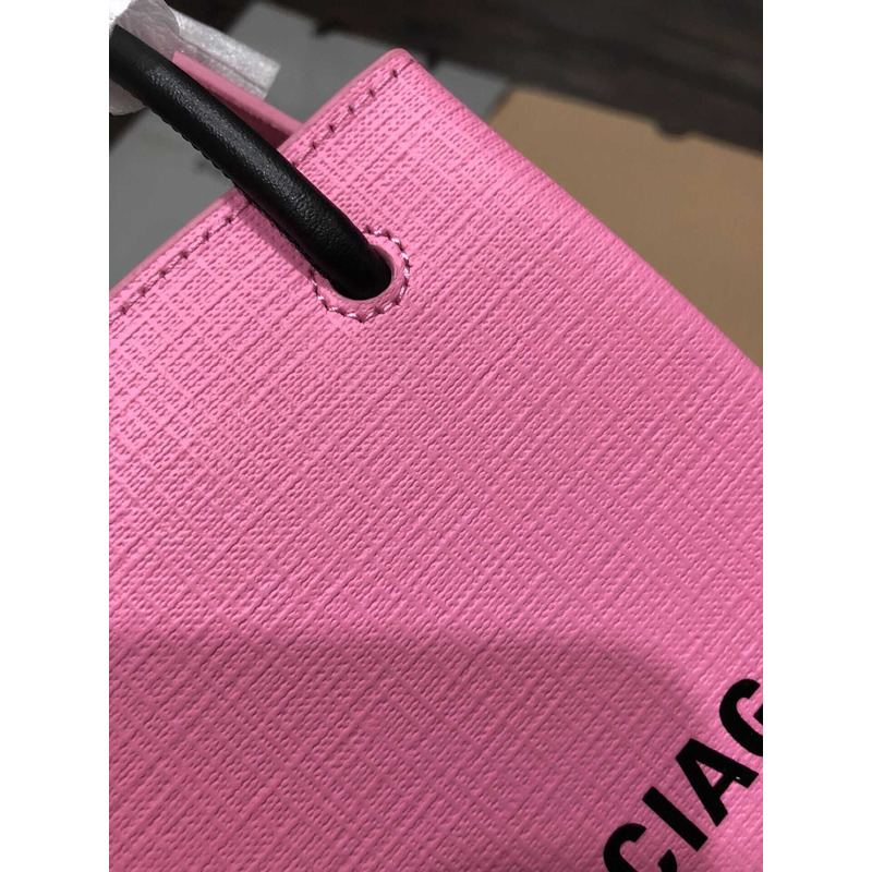 Ba*len*cia*ga textured calfskin logo shopping phone holder bag pink