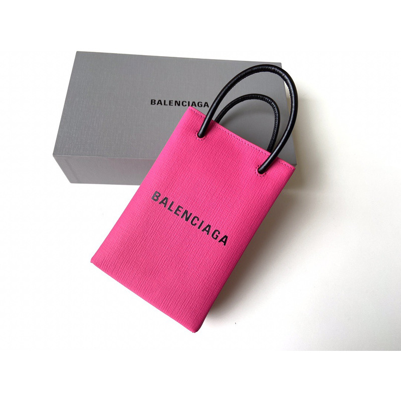 Ba*len*cia*ga textured calfskin logo shopping phone holder bag acid fuchsia