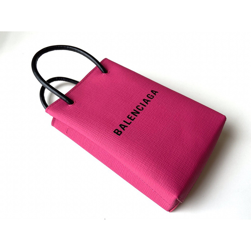 Ba*len*cia*ga textured calfskin logo shopping phone holder bag acid fuchsia