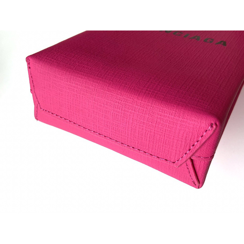 Ba*len*cia*ga textured calfskin logo shopping phone holder bag acid fuchsia