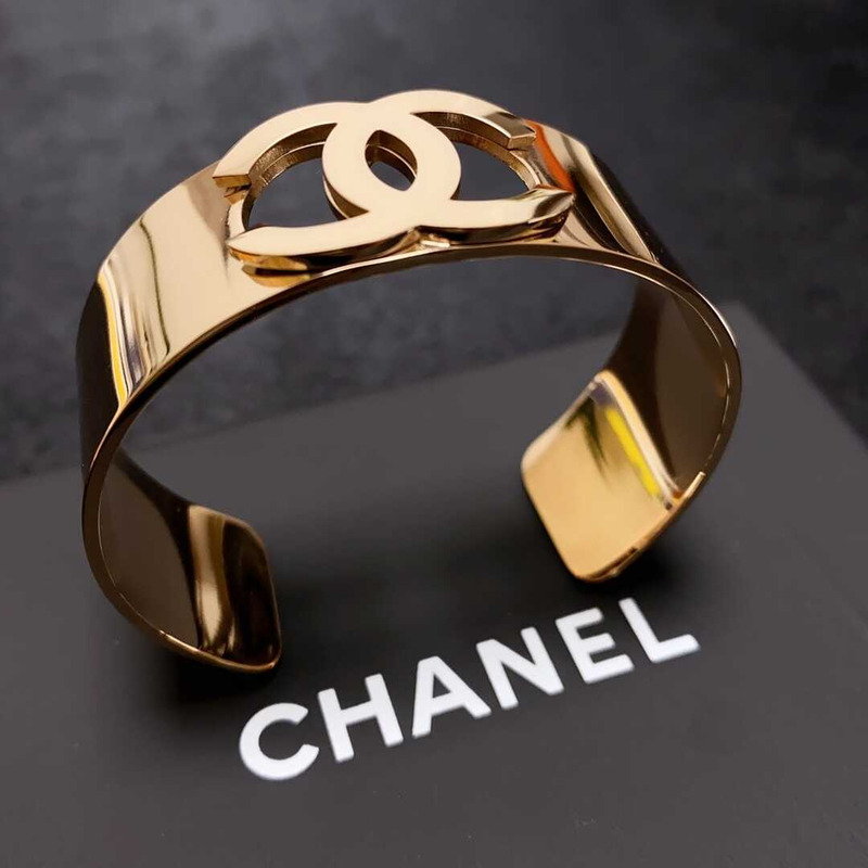 Ch*el skeleton logo bracelet gold