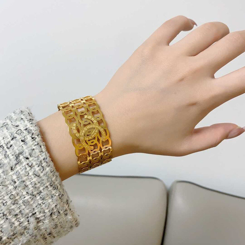 Ch*el cc logo gold open bracelet