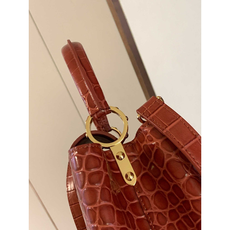 l**is V*t*n capucines mm  crocodile skin bags