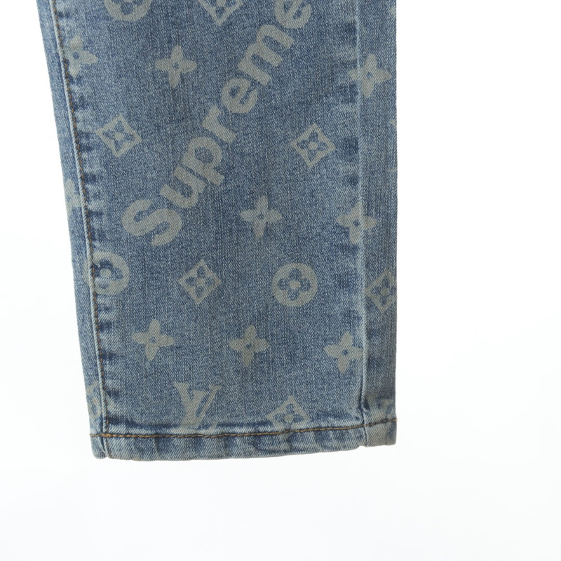 l**is V*t*n monogram logo denim jeans