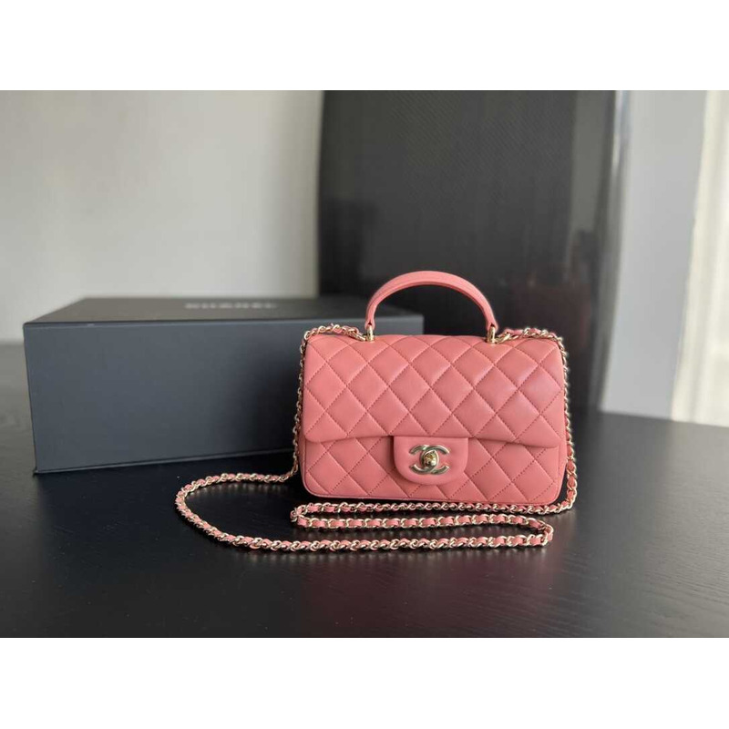 Ch*el pink quilted lambskin top handle mini flap bag