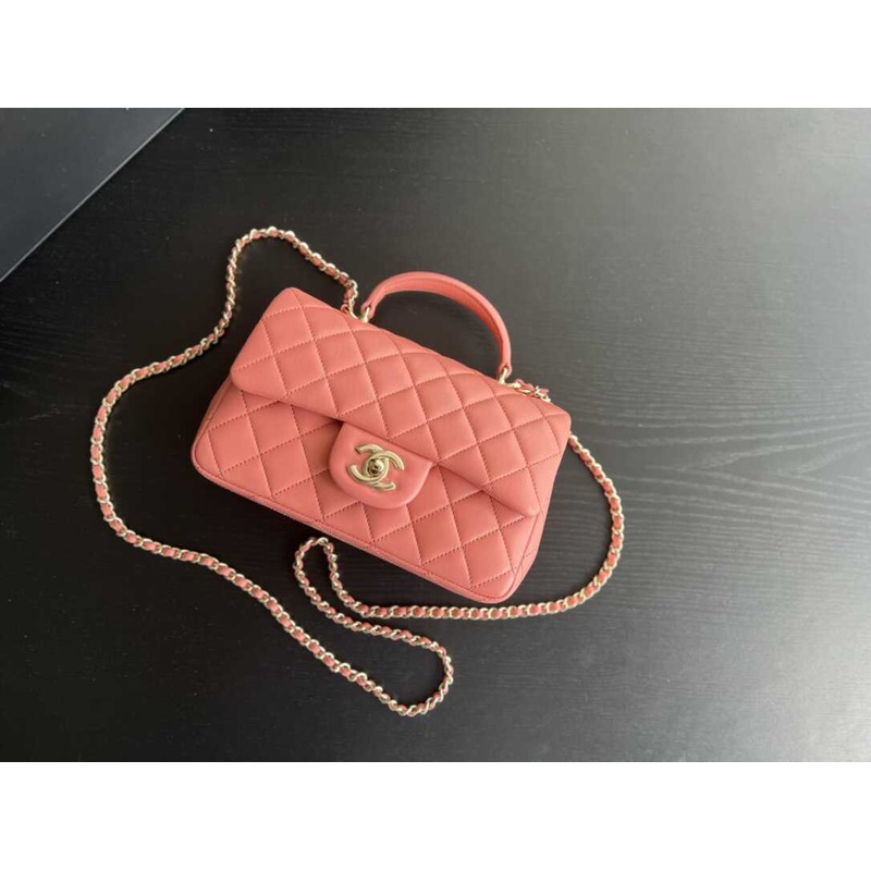 Ch*el pink quilted lambskin top handle mini flap bag