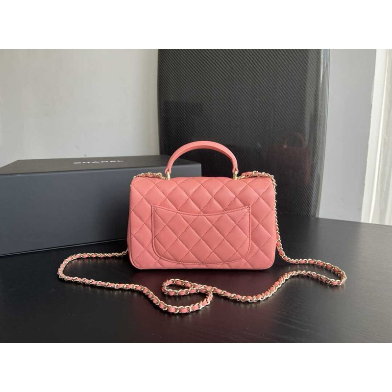 Ch*el pink quilted lambskin top handle mini flap bag