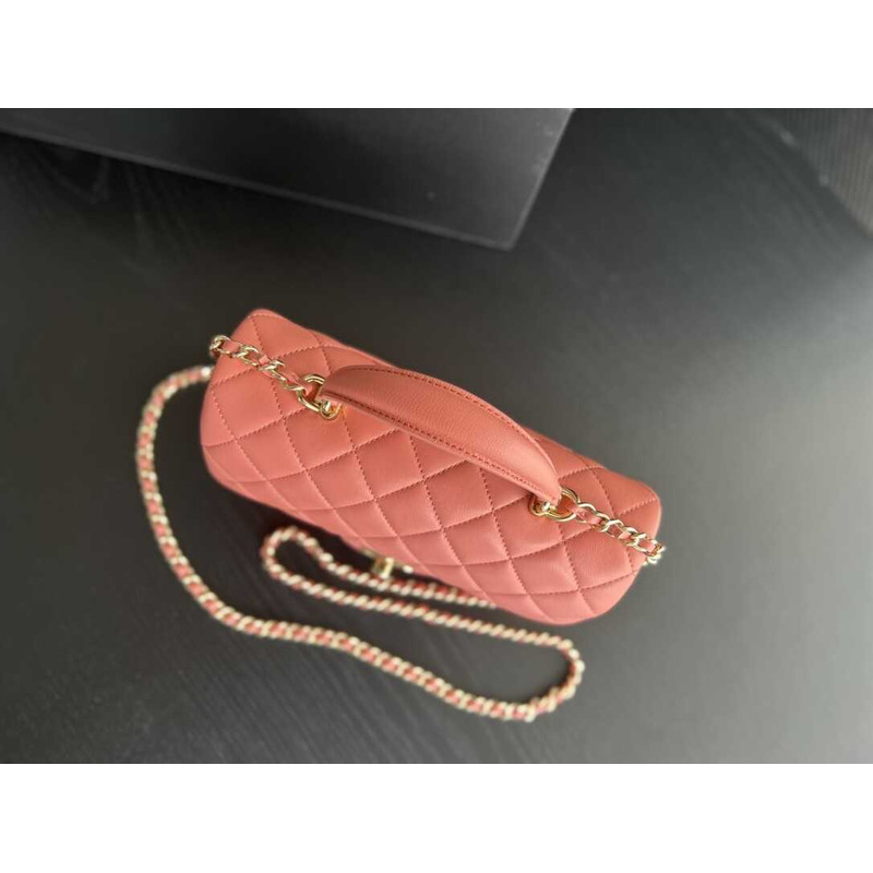 Ch*el pink quilted lambskin top handle mini flap bag