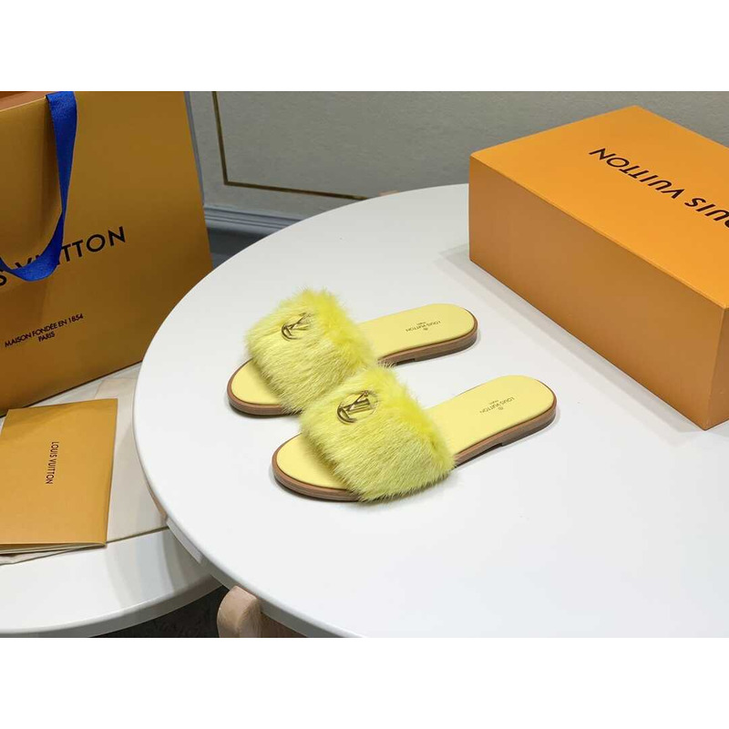 l**is V*t*n yellow furry slippers