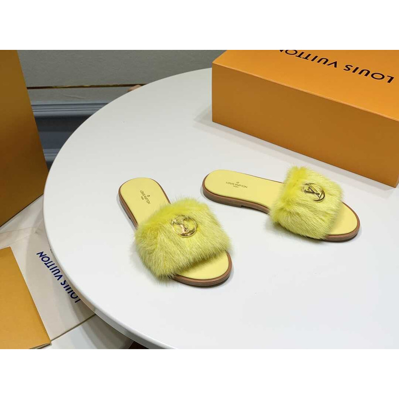 l**is V*t*n yellow furry slippers