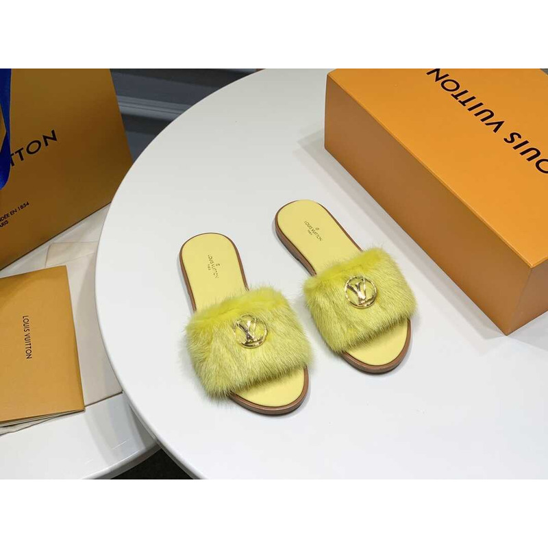 l**is V*t*n yellow furry slippers