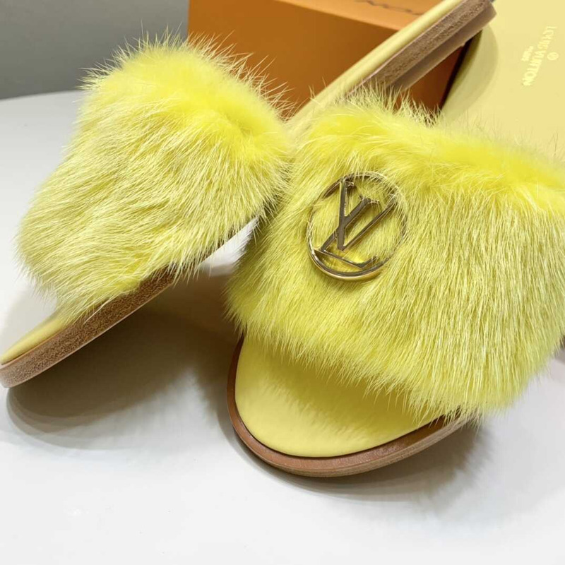 l**is V*t*n yellow furry slippers